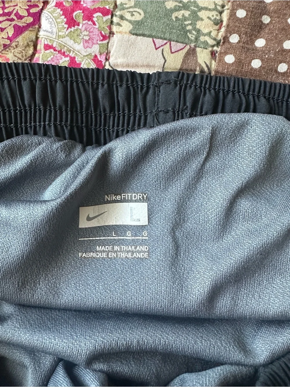 Nike Men’s Black Athletic Shorts with Orange Side Stripes